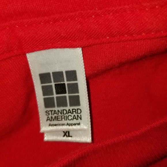 A Coca Cola tee shirt. - Picture 3 of 3